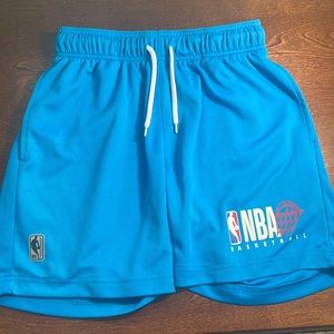 NBA Basketball blue shorts, size adult small